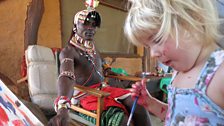 Samburu warrior Mporian painting with Luna