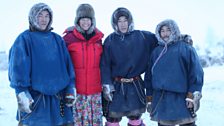 Kate standing with the 3 Nenets men that she filmed with - Kostya, Vitaly and Yeagor