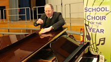 Polishing the piano in preparation...