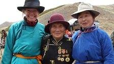 Kate, Chimed and Ordnor in traditional dress at a Yak Festival