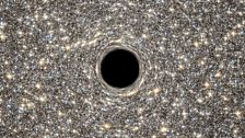 Giant Black Hole in Center of Ultracompact Galaxy