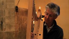 Tim Bayley playing the harp