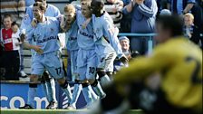 City's substitute Andrew Whing is mobbed after scoring the last ever goal at Highfield Road.