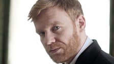 Brian Gleeson plays Powell Imrie, Don’s right hand man