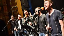 Five-piece harmony group The Overtones in rehersal