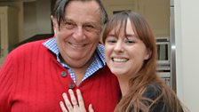 Barry Humphries and very smiley producer Laura Baron in Kathy Lette's kitchen.