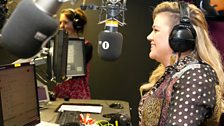 Kelly chats to Clara in the studio