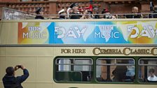 Brass band atop the 鶹Լ Music Day leaving Carlisle