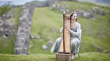 Harpist plays on Hadrian's Wall