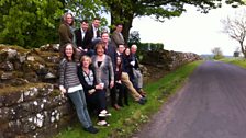 The 鶹 Singers pictured at Hadrian's Wall, Cumbria