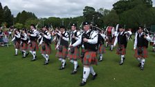 Thiepval Memorial Pipe Band from Donegal marching to the Grade 2 competition area