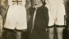 Eric Liddell, right, with a Brownie