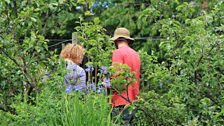 Alasdair shows Pennie around the garden