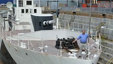 Dick Strawbridge aboard HMS M33 in it's entire dazzle camouflaged glory.