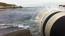 Long lens with a shower-cap on the end to protect it from water, Point Lobos, California, May 2015