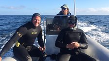 Presenter Steve Backshall and cameraman Simon Enderby in their wetsuits ready to dive in Monterey Bay, California