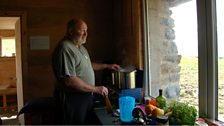 John Arnott in the kitchen.