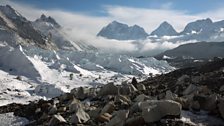 The highest mountains on earth give birth to great rivers of ice – glaciers – which slide downhill under the pull of gravity