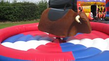 Hana had been due to have to try riding this bucking bronco rodeo game to earn the treasure at Walcott