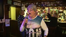 79 year old transgender lady Gladys from Buchlyvie gives it some on the karaoke at her local pub