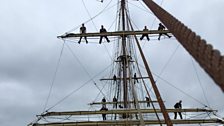 People on masts