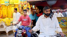 Sona on a rickshaw in Pakistan