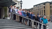 The cast stand to attention outside Usher Hall in Scottish Opera's concert production of HMS Pinafore