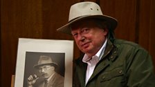 John Sergeant with a photograph of Arthur Ransome