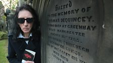 Dr John Cooper Clarke at the grave of Thomas de Quincey