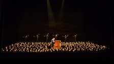 The solo organist, James McVinnie with dancers in the background, from this year's production of Saul from Glyndebourne