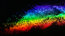 The visible spectrum captured by water droplets in mid-air