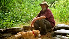 Brent Shock takes a break from gold prospecting near Jamestown, California