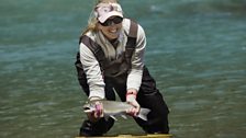 Jo catches a beautiful bull trout during their second challenge