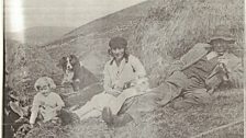 Alice with her parents and Moss, the dog