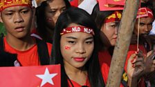 NLD supporter waiting for Aung San Suu Kyi at a rally near Yangon