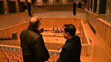 Krishna Thiagarajan shows Jamie the new Auditorium.