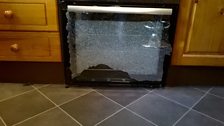 Shattered glass oven door.