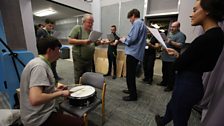 Rebel Band with actors Seamus O'Neill in green (left) Jonathan Keeble (middle) and Shannon Flynn (right)