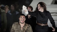 Preziosilla (Rinat Shaham) kills captured soldiers in Verdi's Forza del Destino from the English National Opera