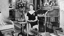 The Queen photographed for her 1960 Broadcast with her corgi, Sugar, by her side!