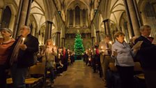 The congregation with candles at the end of the carol service