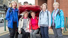 Local fans try out the Sport Relief rickshaw