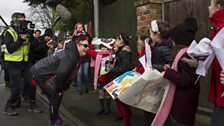 Local school children line the streets to give Jo their support