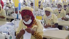 A worker on the production line at the C&H Garments factory