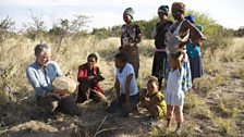 Gordon learning from the Ju/’hoansi Bushmen how to find a tuber