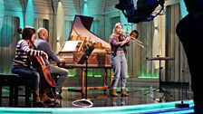 Gemma Riley rehearses on stage before the Brass final with her accompanists Martyn Parkes and Natalie Halliday