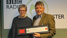 Trevor and Cherrie and the certificate of honour