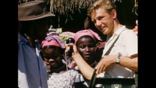 David Attenborough plays back recordings to astonished villagers – they have never heard themselves on a tape recorder before