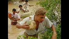 David Attenborough (carrying coconuts) on Komodo