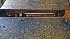 Georgian school desks in the space where Shakespeare may have seen a play for the first time